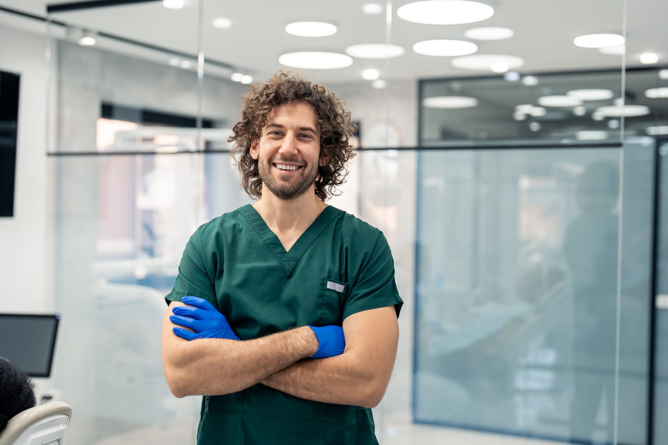 Young dental surgeon posing for portrait photo